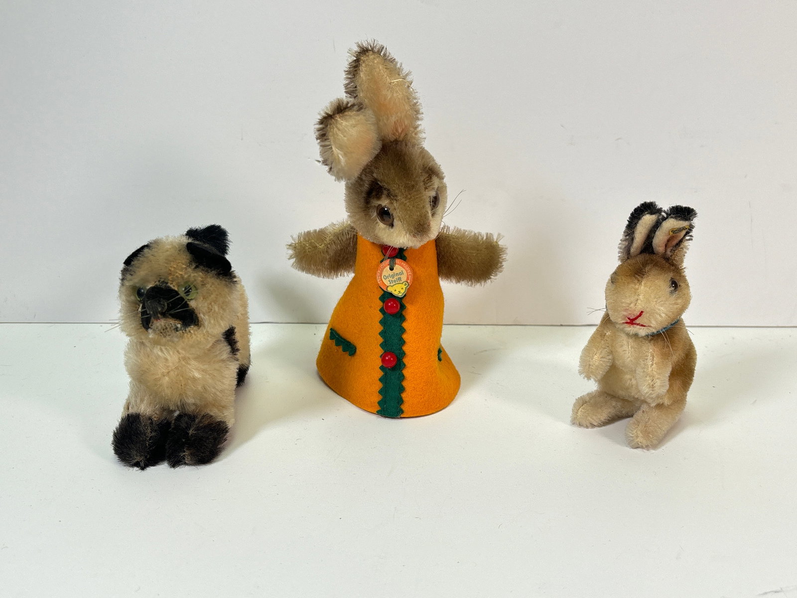 (3) Vintage 1950s-60 Steiffs -: (3) Vintage 1950s- 1960s Steiffs. These are cute old steiff stuffed collectibles. They are all in good condition for their age. Minor signs of wear from over the years. They are great nostaglic gifts 