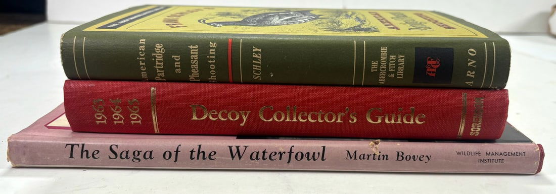 3) Books - 1971 Decoy Collectors Guide, 1949 The Saga Of The Waterfowl by Martin Bovey - First: Book 1: Decoy Collectors Guide 1971 Reprint- Orginally Printed As A Quarterly Booklet, This Volume Includes All 12 Booklets Reprinted From The Original Plates. Pages And Binding Are In Amazing Conditi