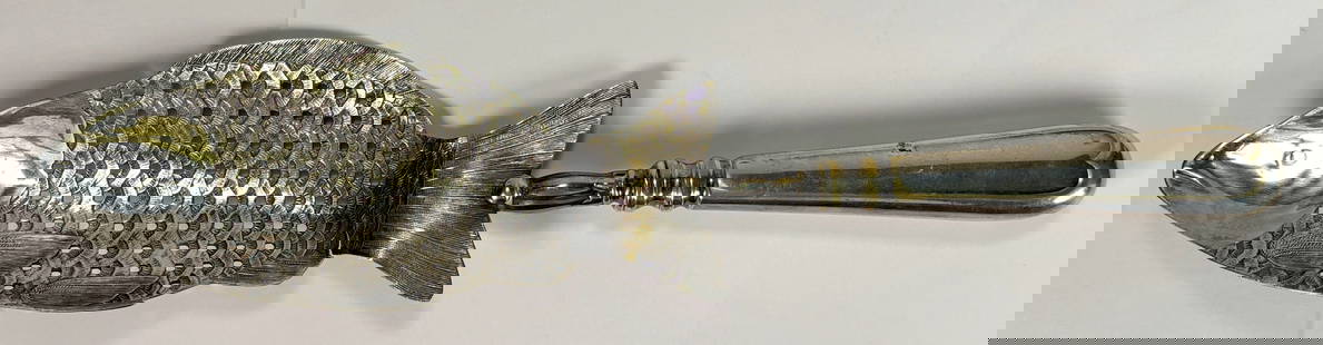 Galwaniz G.P Silver Fish Serving Spoon: 1 Silver Fish Serving Spoon. Stamped on the back of the handle by Galwaniz G.P. A piece that will bring a elegance to any table. A great piece to gift anyone. The spoon is perfectly shaped to scoop