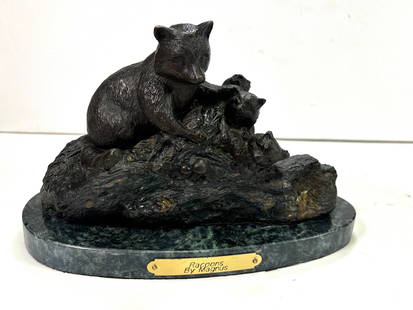 Racoons by Magnus Brass Statue on Marble: Racoons by Magnus Brass Statue on Marble. A beautiful scuplture. It depicts of a mother raccoon with her three cubs nestled among the rocks. The sculpture is mounted on a green marble base with a