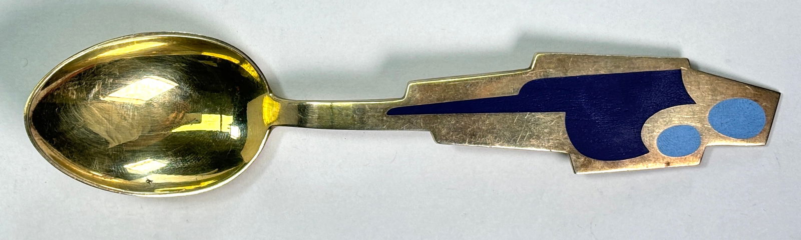 A. Michelsen Christmas Spoon - Madonna and Child - Carl. R. Frederiksen 1962- 24kt G.P. over 925 S.S: A. Michelsen Christmas Spoon - Madonna and Child - Carl. R. Frederiksen 1962. A beautiful 24kt Gold Plate over 925 Sterling silver spoon with beautiful enamel design. It captures the essences of holid