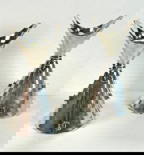 925 Sterling Silver Camusso Modern Candlesticks- Made in Peru: 925 Sterling Silver Camusso Modern Candlesticks. They were Made in Peru. These two elegant pieces are a testament to exquisite craftsman ship. They will add a touch of sophistication to any setting. T