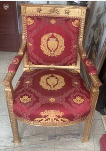 Roger Prigent's Malmaison Empire Giltwood Fauteuil Early 19th Century, Reglit Chair: This is a beautiful Roger Prigent's Malmaison Chair. The incurving crestrail carved with stars flanking a palmette above a padded back and seat covered in a crimson and gold laurel patterened damask c