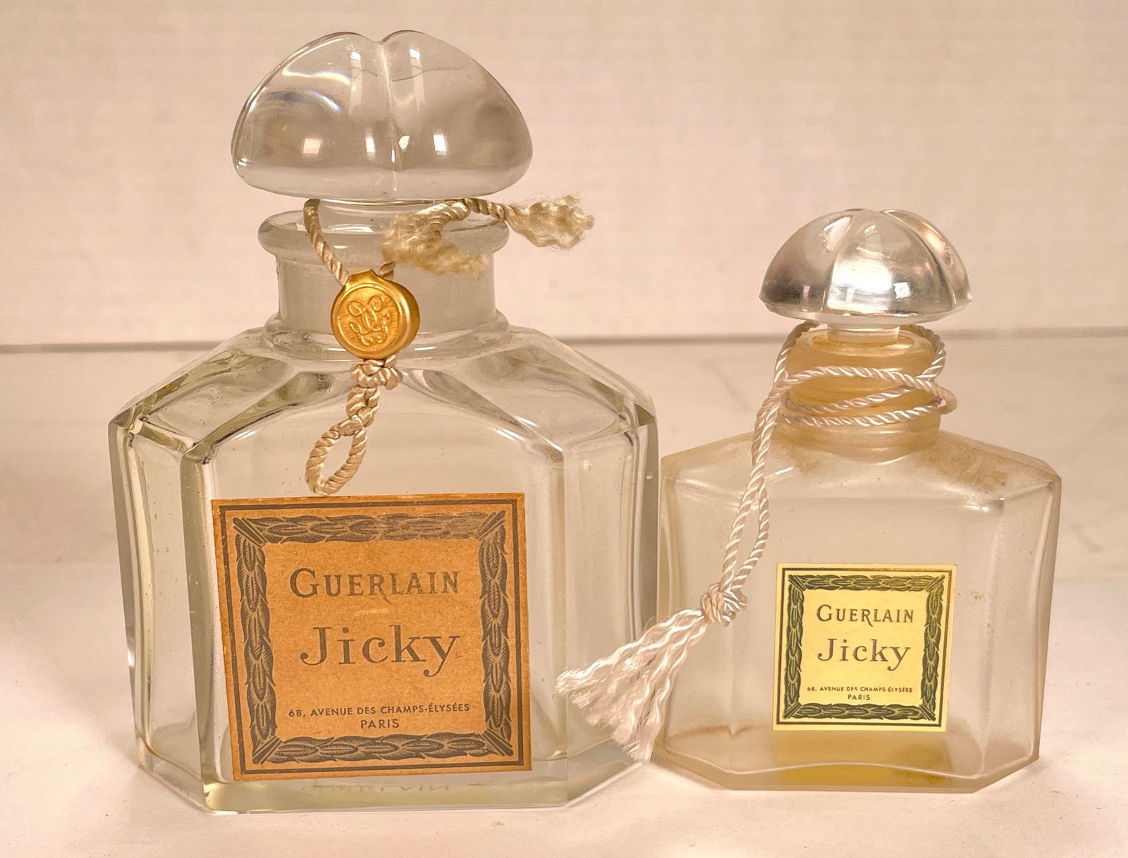 2 - Vintage Guerlain Paris Jicky 1 & 2 Fl Oz Baccarat Parfum Bottles with Stopper Made in France: Two Vintage Guerlain Paris Jicky 1Fl Oz Glass Parfum Bottle with Stoppers Made in France. beautiful parfum bottles, they are all meticulously crafted in baccarat bottles. The design reflects the art d