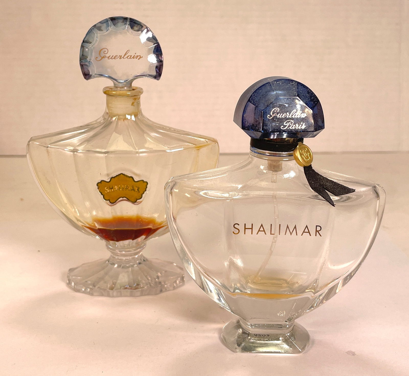 (2) Vintage Guerlain Paris SHALIMAR Baccarat Crystal Perfume Bottles: Two Vintage Guerlain Paris SHALIMAR Baccarat Crystal Perfume Bottles. These are beautiful perfume bottles, they are in both in great vintage condition. These luxrious bottles crafted to represent eleg