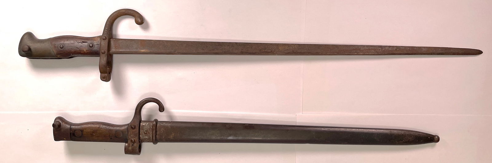 (2) Vintage WWII French Bayonet 1939-1942: (2) Vintage WWII French Bayonet 1939-1942. These are cool old bayonets, they are in worn but good condition for their ages. Own a piece of history with these authentic bayonets. Relics from one of