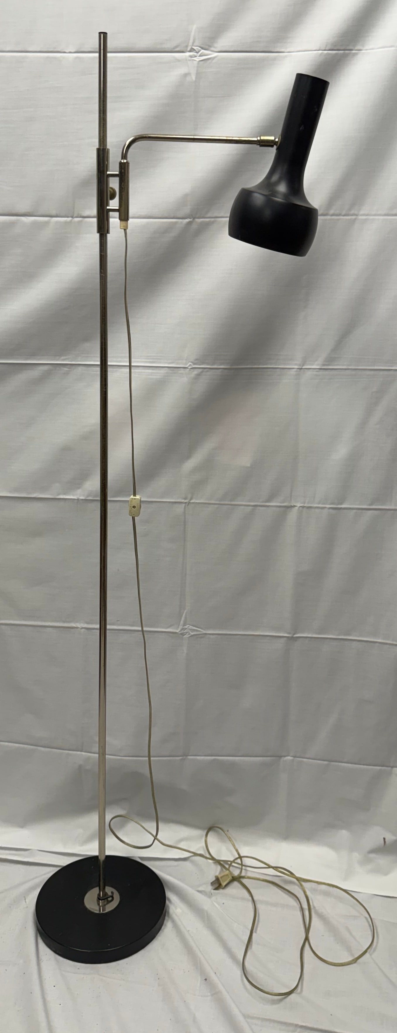 1970s Minimalist Tulip Floor Lamp Swiss Lamp Inter: This lamp embodies a futuristic yet organic sensibility. It is minimalist design allows it to blend seamlessly into a variety of settings, while the distinct shapes makes this lamp both versatile and 