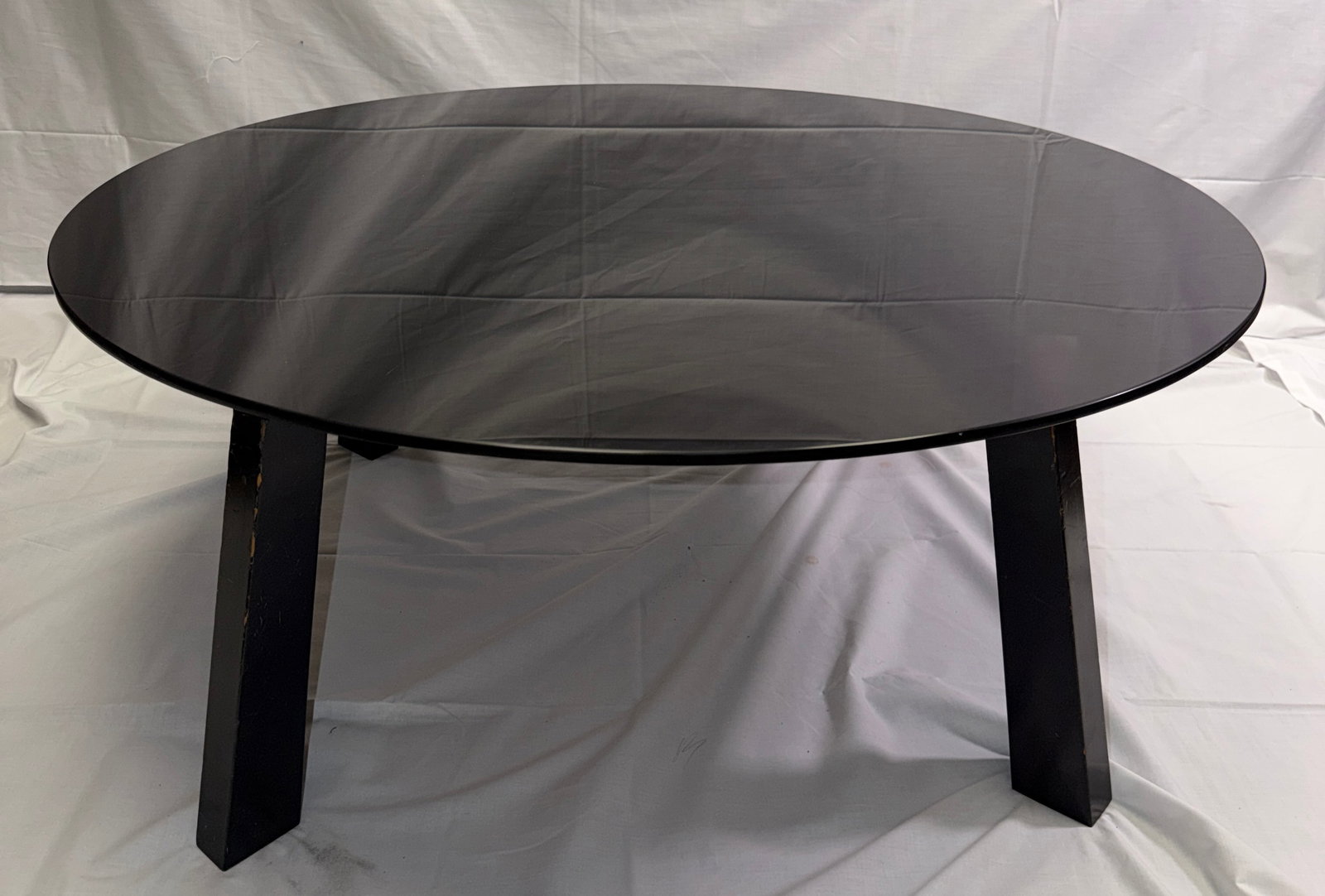 Contemporary Black Glass Top Table: A beautiful modern table, it is in great condition. It features black glass top, that gives off a sleek sophisticated vibe. Great for a minimalist design that will elevate any living space. The base i