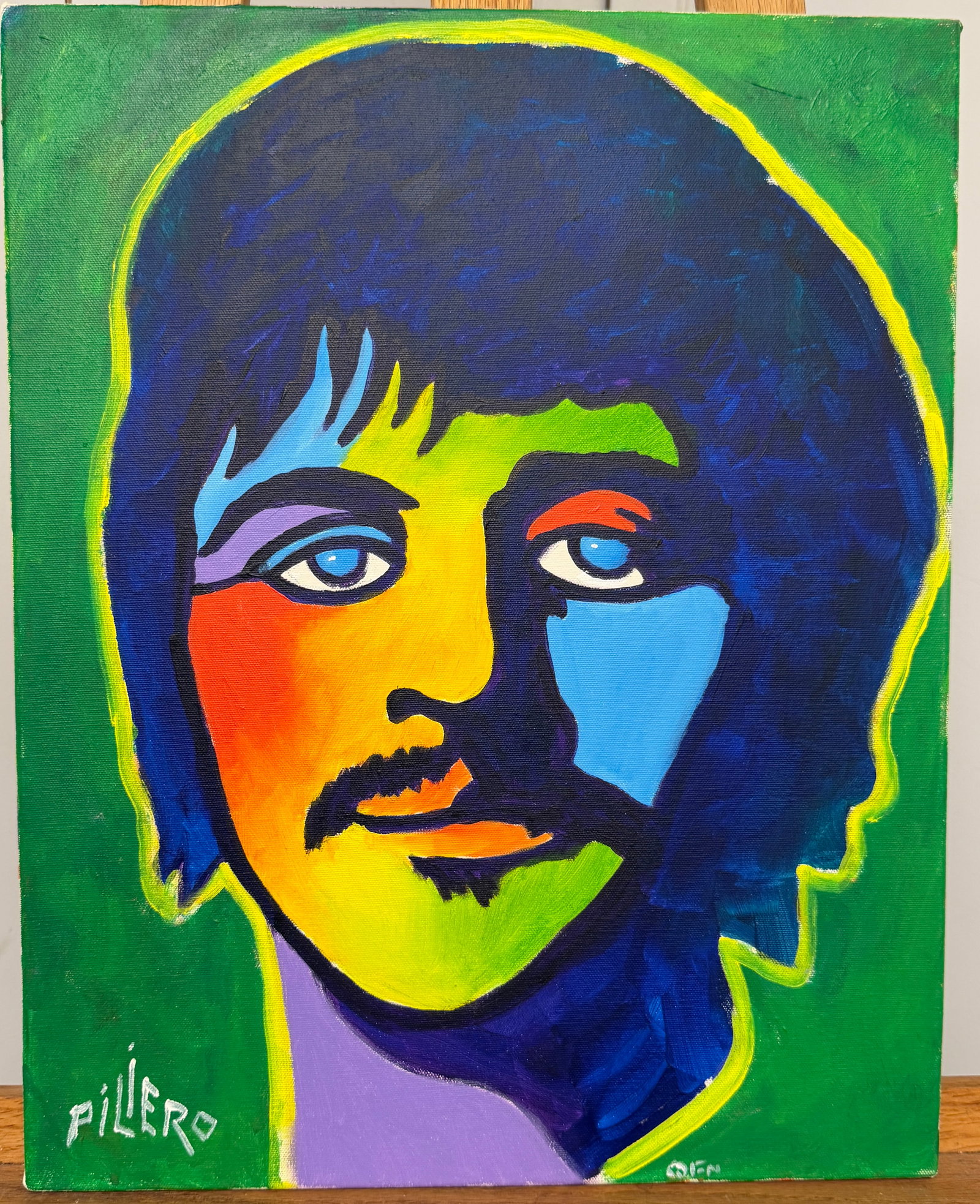 Portrait of Ringo Starr by Nick Piliero Canvas Acrylic Painting 2016: This is a striking Portrait of Ringo Starr by Nick Piliero Canvas Acrylic Painting, Dated 3/2016. This piece is an incredible eye catching vivid portrait that has crisp smooth lines and a retro look.