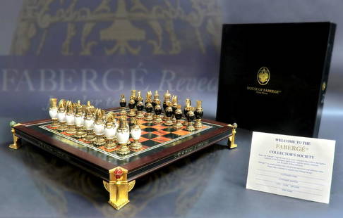 Fabergé Imperial Jeweled Chess Set: Fabergé Imperial Jeweled Chess Set. The chess set consists of 32 pieces constructed from enamelled Fabergé eggs, with 24 carat gold plated finish. Four chess pieces (bot kings and queens) contain a