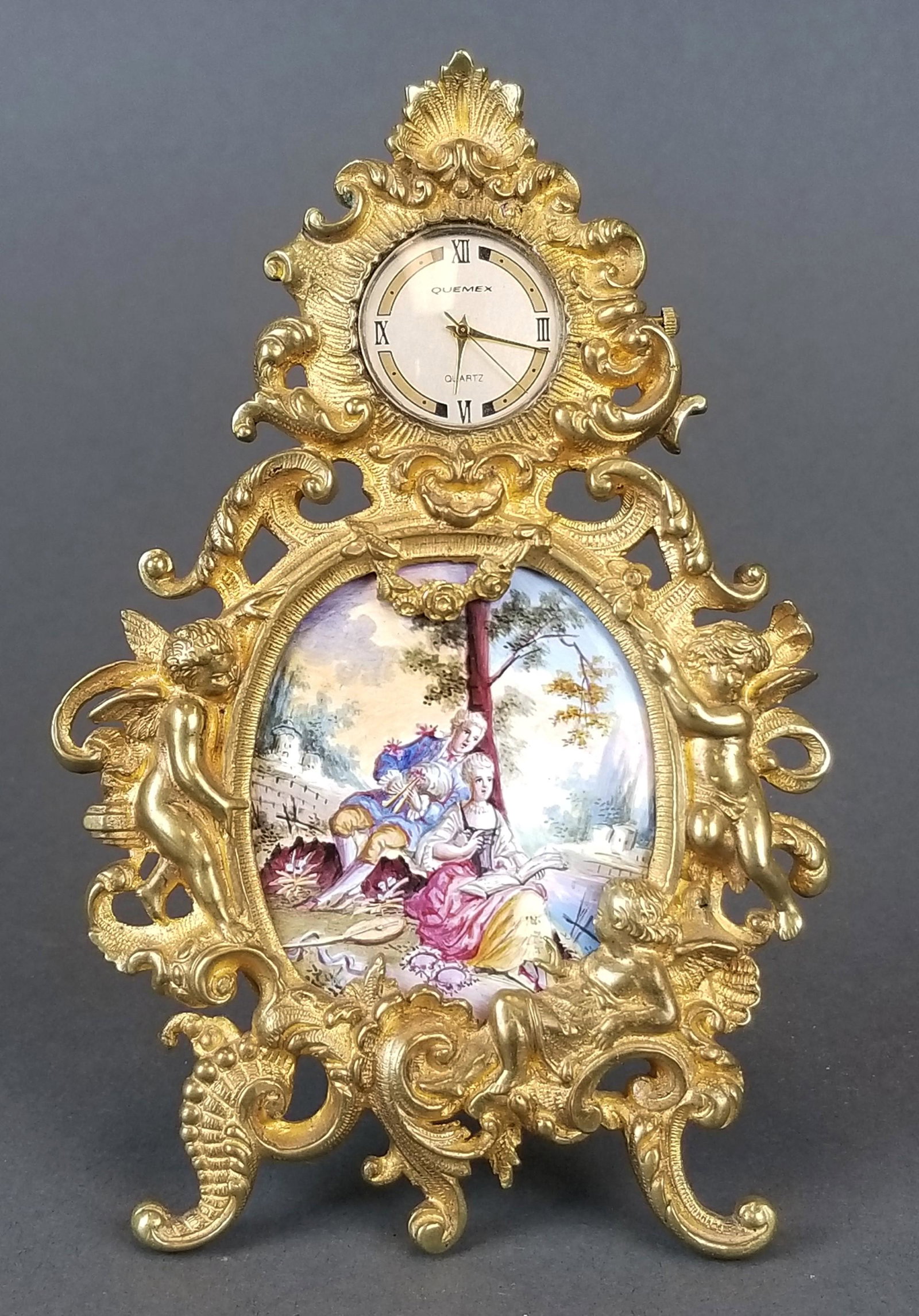 19th C. Veinnese Enamel and Bronze Clock: 19th C. Veinnese Enamel and Bronze Clock. Measures H: 5 1/4" W: 3 1/4"