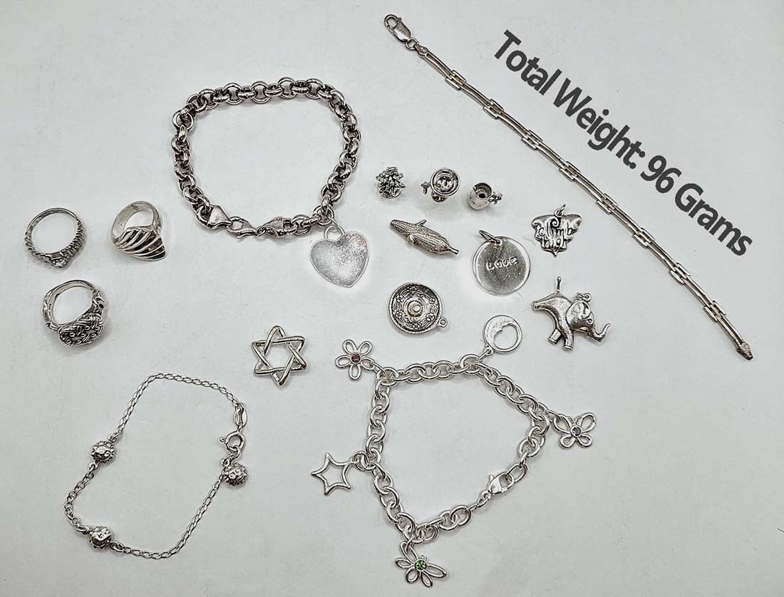 Lot Of Silver Jewelry (96 grams) 3 Rings, 9 Charms, 7 Bracelets: Lot Of Silver Jewelry (96 grams) 3 Rings, 9 Charms, 7 Bracelets.