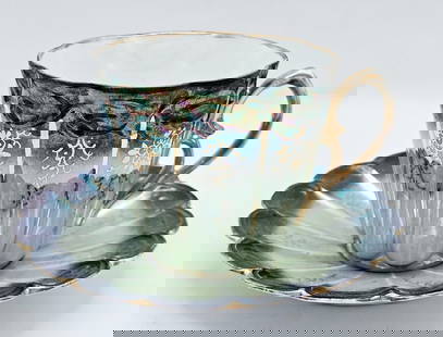 19th C. French Cup & Saucer: 19th C. French Cup & Saucer. Cup: H 3 1/2" x W 3 7/8" x L 4 1/2" \ Saucer: D 6 1/4"