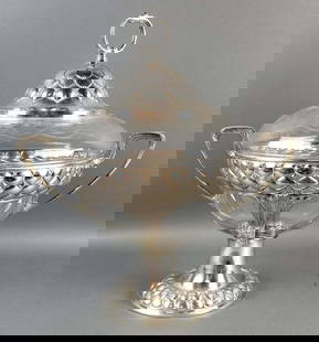A WMF Art Nouveau Silver plated and Glass Punch Bowl: A WMF Art Nouveau Silver plated and Glass Punch Bowl Centerpiece w/ Handles. Measures H: 18" W: 17 1/2"