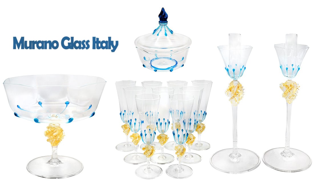 Lot Of (13Pieces) Venetian Murano Stemware: Lot Of (13Pieces) Venetian Murano Stemware. Champagne Glasses, Candy Dishes, Candlesticks. Big bowl: H 8 7/8" x W 9" \ Candy dish with lid: H 6" x W 5 1/2" \ Candlesticks: H 12 1/2" x W 5 1/4" \ Champ