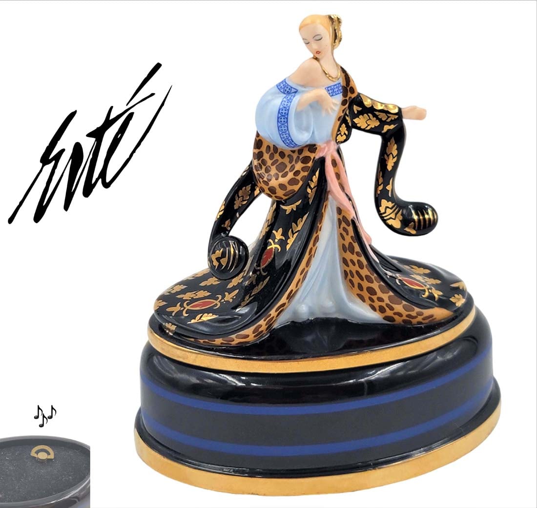 Rigoletto, House of Erte Figural Music Box: Rigoletto, A Rare The Franklin Mint House of ERTE Porcelain Figural Music Box. Sevenarts Ltd Hallmark. Music: Rigoletto. H 4 1/3" x 4" x 2 1/4"