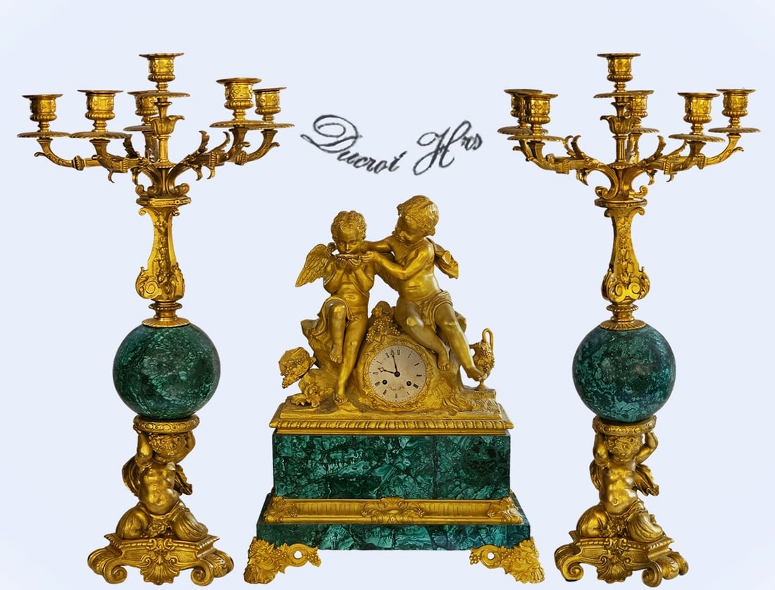 19th C. French Figural Bronze On Malachite Clock Set, Signed: 19th C. French Figural Bronze On Malachite Clock Set, Signed. Candelabras: H 28 1/2" x W 14" \ Clock: H 23" x W 8" x L 18"