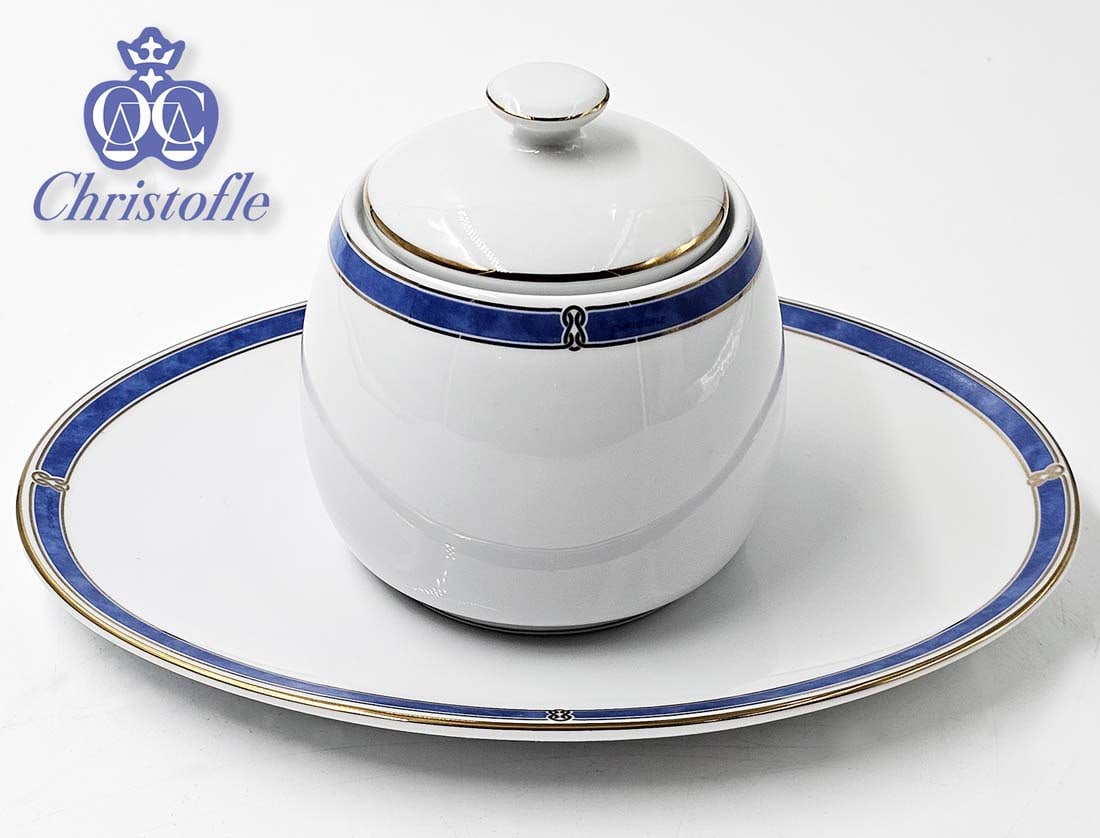 Lided Sugar Bowl With Oval Saucer Christofle Porcelain: Lided Sugar Bowl With Oval Saucer Christofle Porcelain. Saucer: H 7/8" x W 6" x L 8 1/2" \ Bowl: H 4" x W 3 1/2"