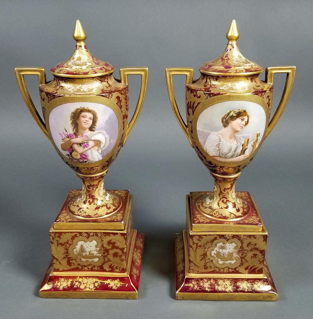Pair of 19th C. Royal Vienna Covered Urns: Pair of 19th C. Royal Vienna Covered Urns. Measures H: 19 1/4" W: 9"