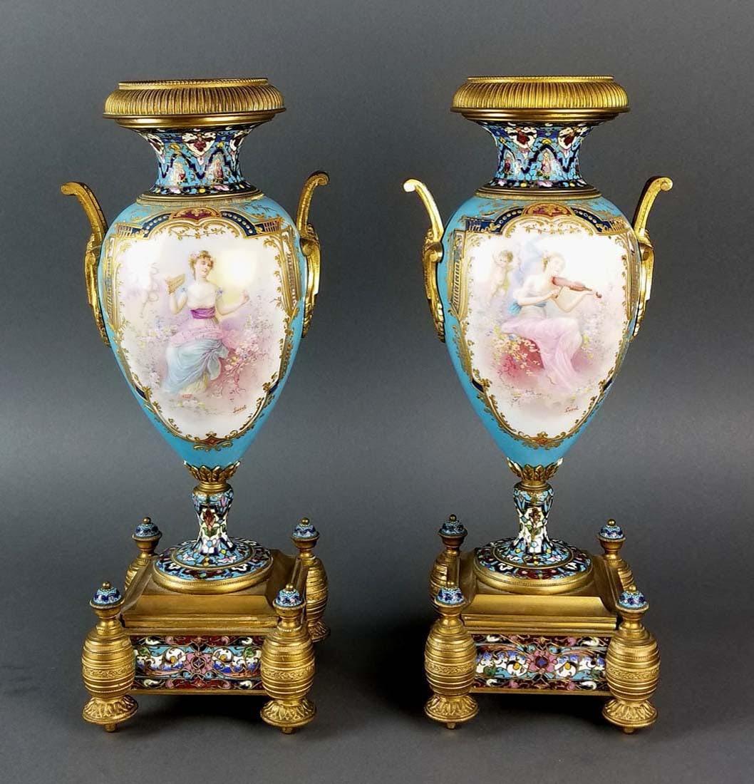 Pair of 19th C. Large Sevres and Champleve Enamel Vases: Pair of 19th C. Large Sevres and Champleve Enamel Vases. Measures H: 13 1/4" W: 4 3/4"