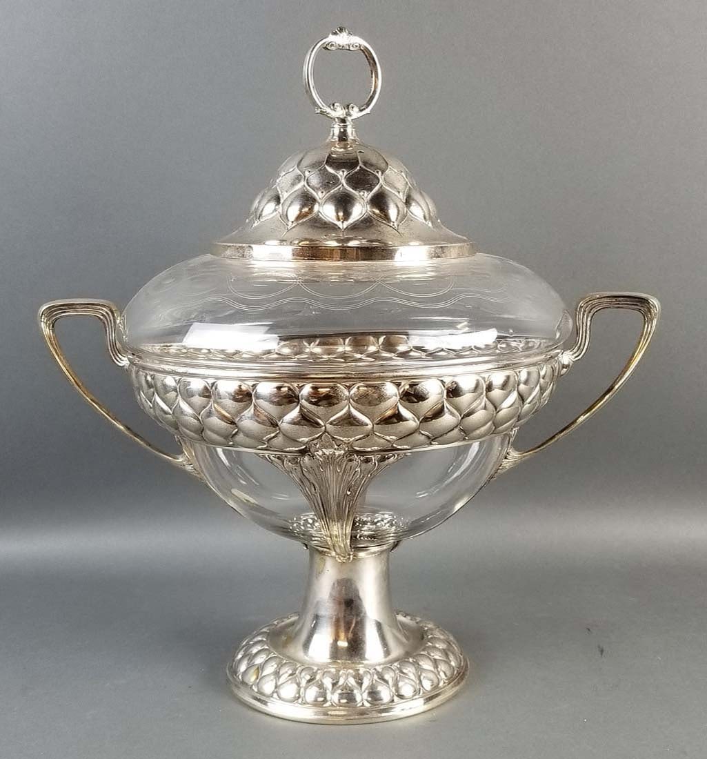 A WMF Art Nouveau Silver plated and Glass Punch Bowl: A WMF Art Nouveau Silver plated and Glass Punch Bowl Centerpiece w/ Handles. Measures H: 18" W: 17 1/2"
