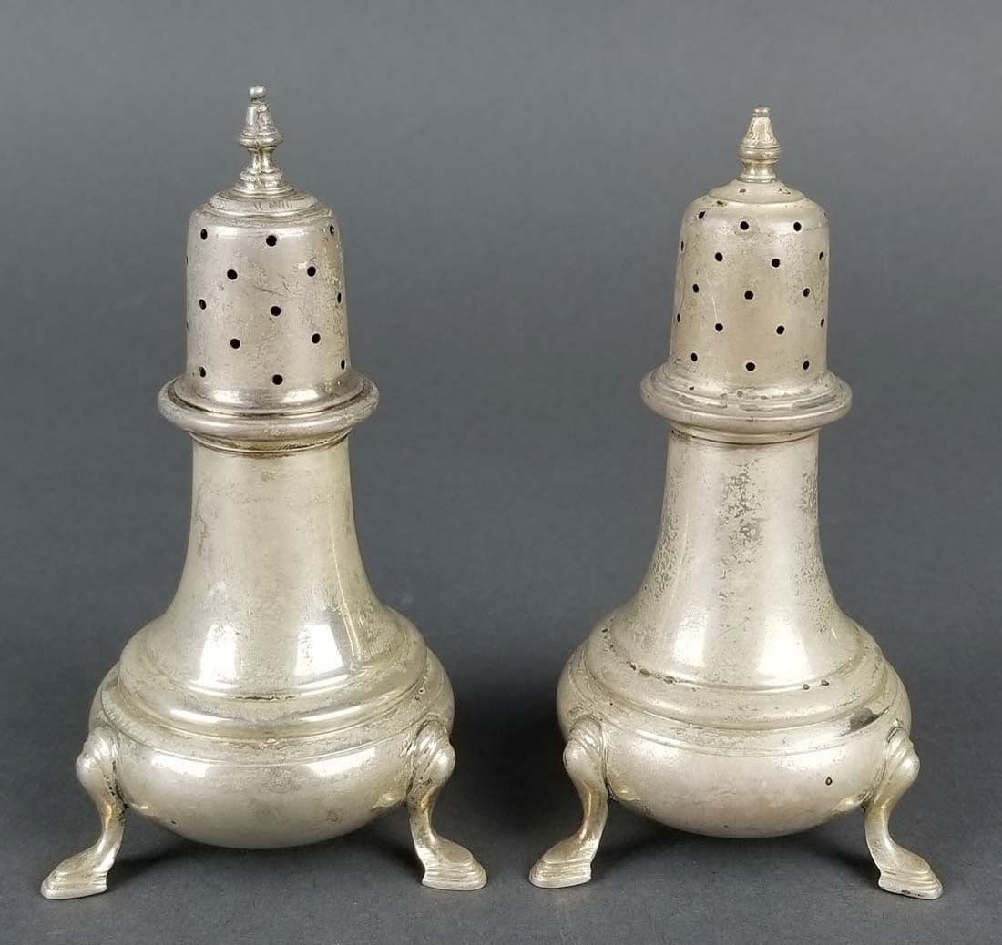 Pair of Sterling Silver Salt Shakers: Pair of Sterling Silver Salt Shakers. Measures H: 4 3/4". Weight is 173 grams