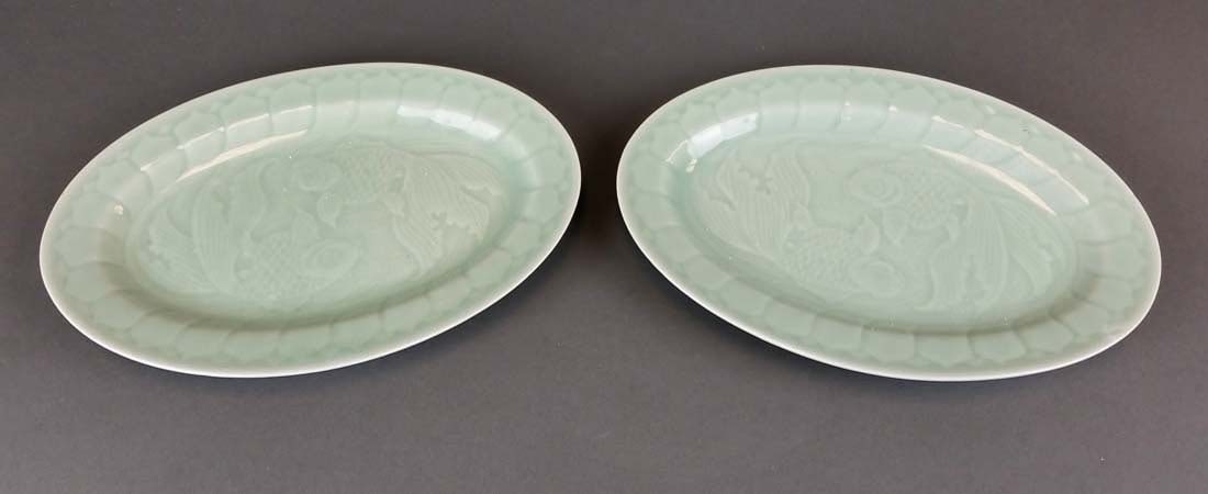 Pair of Chinese Porcelain Plates: Pair of Chinese Porcelain Plates. Measures 10" x 6 3/4"