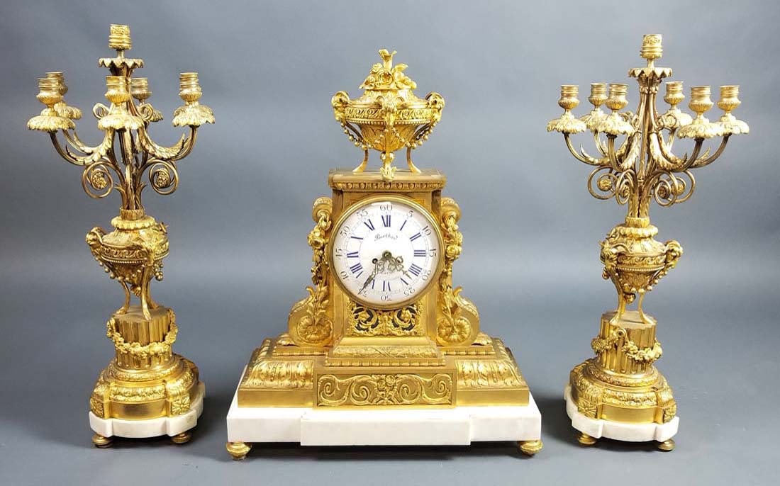 19th C. 3 Pc. French Gilt Bronze and Marble Clockset: 19th C. 3 Pc. French Gilt Bronze and Marble Clockset. The clock measures H: 27" W: 22"
