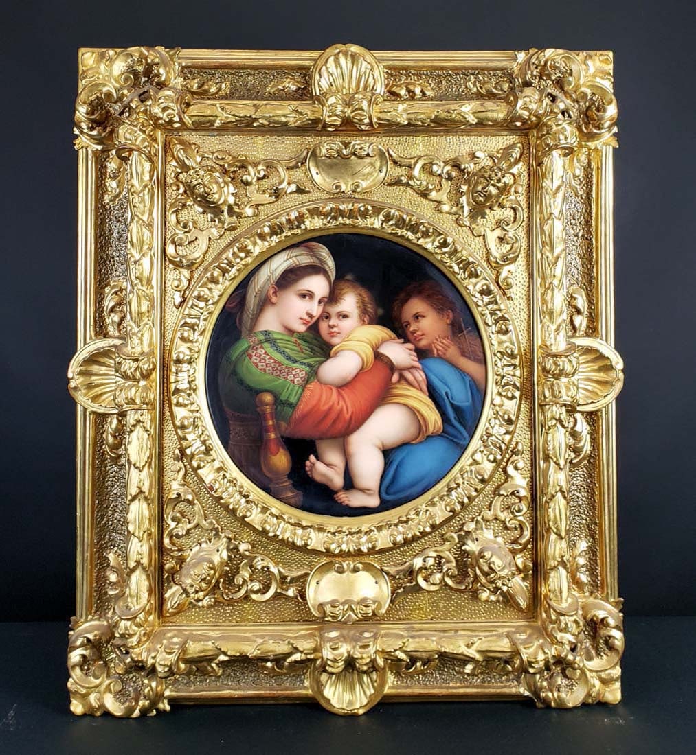 German Painted Porcelain Plaque of Madonna, Circa 1900: German Painted Porcelain Plaque of Madonna, Circa 1900. The frame measures 27" x 22 1/4" and the plaque measures 11 3/4" Diameter