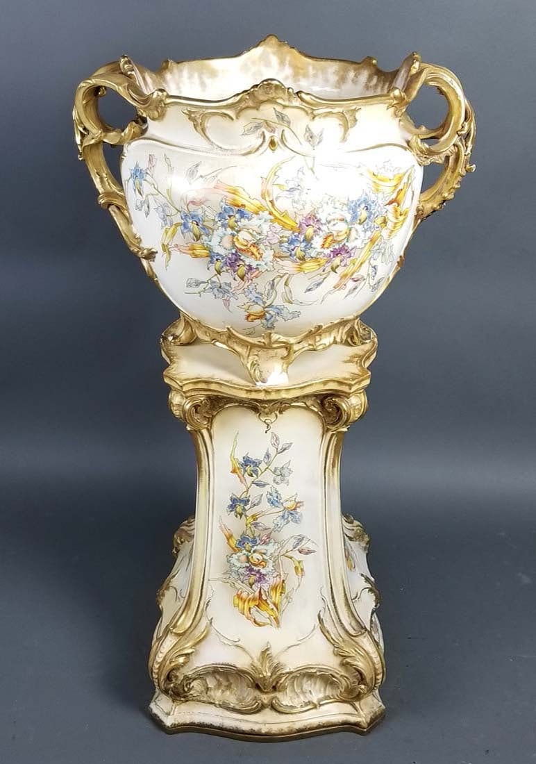 Late 19th C. Royal Bonn German Porcelain Planter on: Late 19th C. Royal Bonn German Porcelain Planter on Stand. The bowl measures H: 16 3/4" W: 32", the base measures H: 24" W: 12 1/2", and overall height is 45"