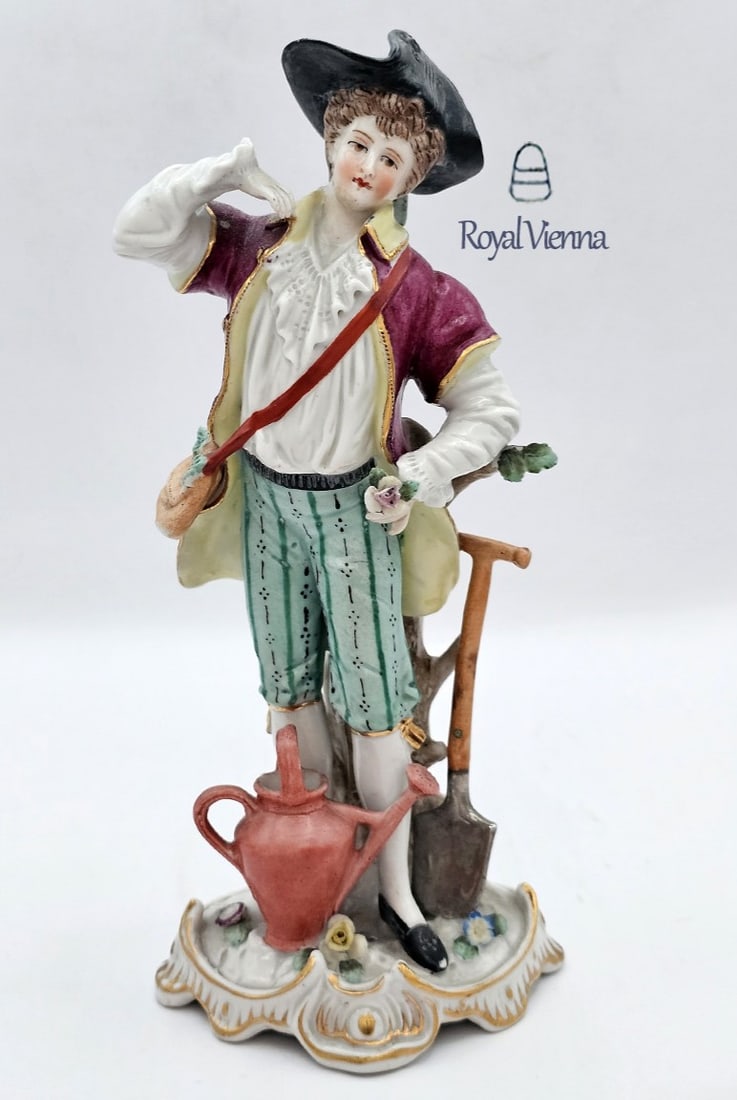 19th C. Royal Vienna Porcelain Figurine Of A Farmer Boy: 19th C. Royal Vienna Porcelain Figurine Of A Farmer Boy. H 7 7/8" x W 2 7/8" x L 3 7/8"