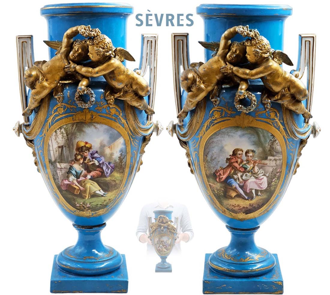 Pair Of 19th C. Figural Hand Painted Sevres Vases: Pair Of 19th C. Figural Hand Painted Sevres Vases. H 15 1/2" x W 7" x L 8"
