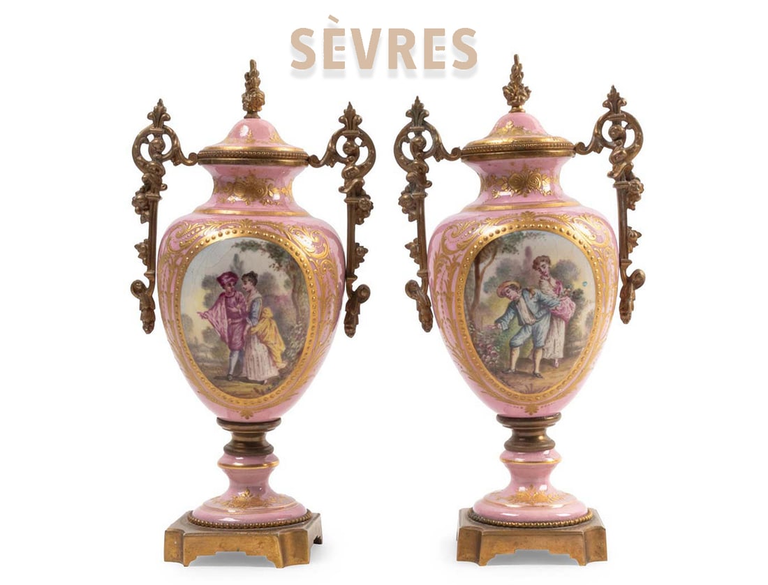 Pair Of Sevres Porcelain And Bronze Urns: Pair Of Sevres Porcelain And Bronze Urns. H 11" x W 4 1/2" x L 5 1/2"