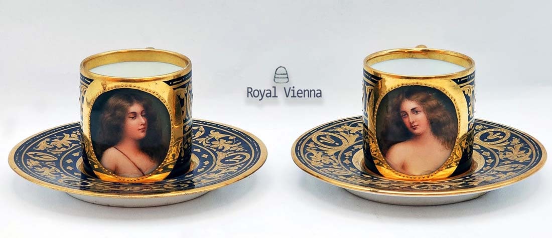 Pair Of Royal Vienna Cup & Saucers: Pair Of Royal Vienna Cup & Saucers. Cups: H 1 7/8" x W 1 5/8" x L 2 1/2" \ Saucers: D 4"
