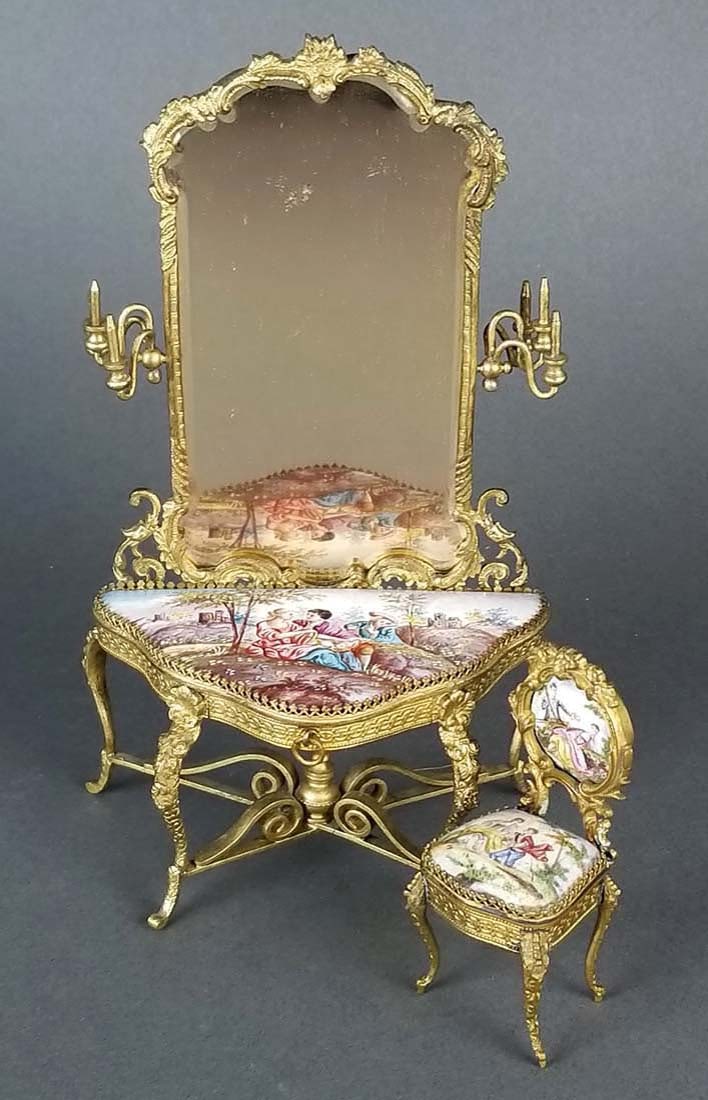 19th C. Austrian Viennese Enamel Vanity Table with: 19th C. Austrian Viennese Enamel Vanity Table with Chair. The vanity table measures H: 7 3/4" W: 4" and the chair measures H: 2 1/4"