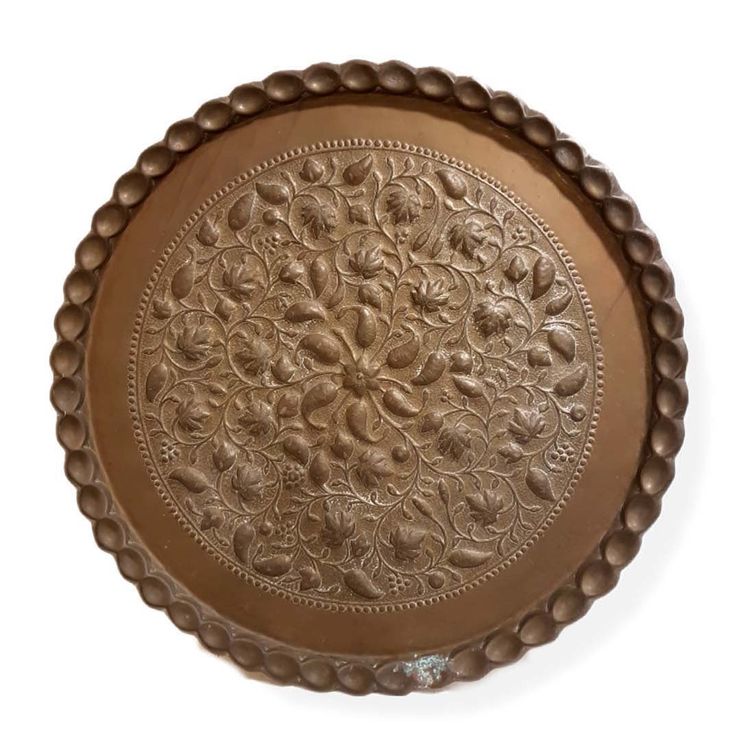 A Large Persian Hand Carving Copper Tray: A Large Persian Hand Carving Copper Tray. Diameter: 36"