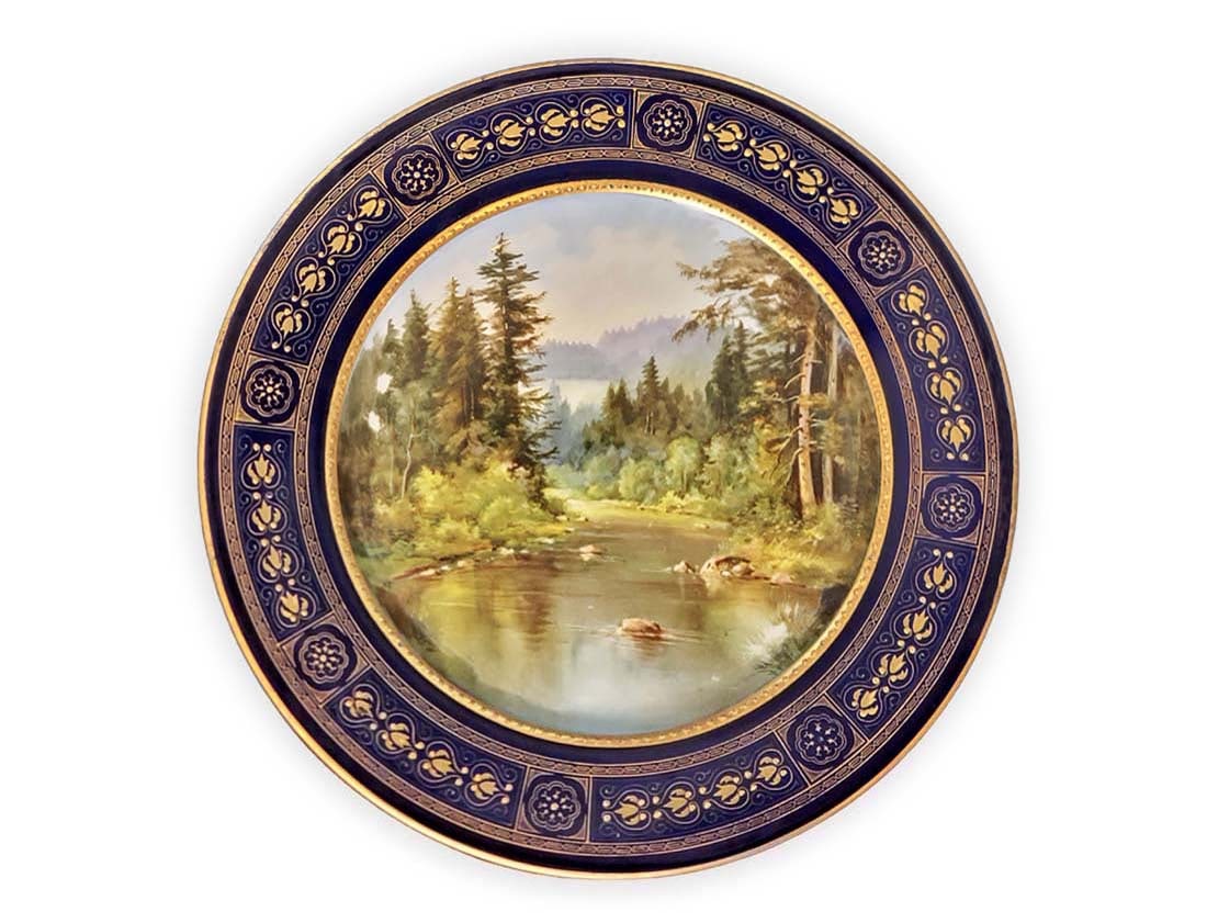 Late 19th C. Hand Painted German Porcelain Plate: Late 19th C. Hand Painted German Porcelain Plate. Hand Painting of a river scene. Boarder is designed with gold leafs. D 9 1/2"