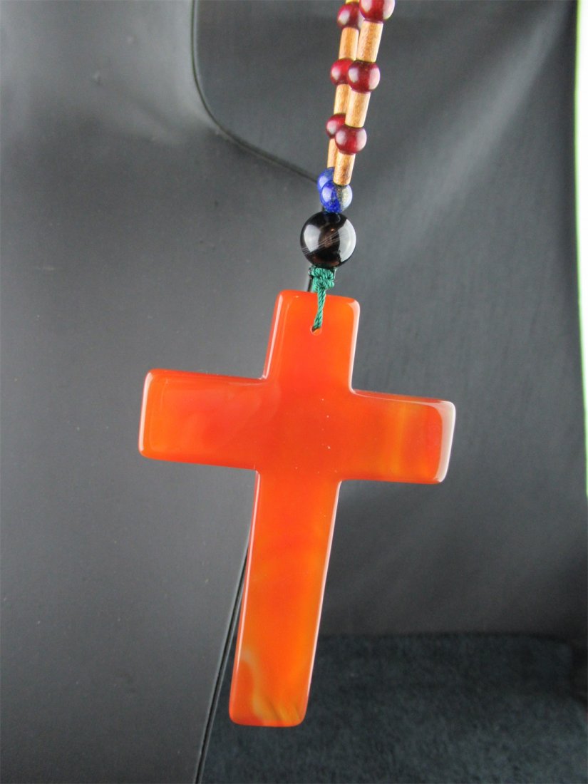 Natural Red Carnelian Cross Pendant: Natural Red Carnelian Cross Pendant on chain with light brown and red beads. This lot has NO RESERVE! The bidding starts at $1 to make room for new items. Dimensions: 4.2" (L) x 2.8" (W) x 0.2" (D), N