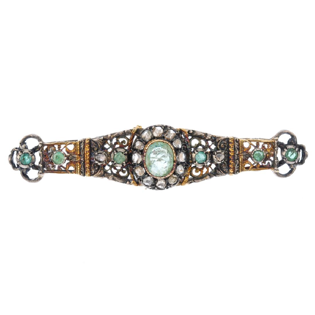 A beryl and diamond bar brooch. Of bi-colour design, (1 of 2)