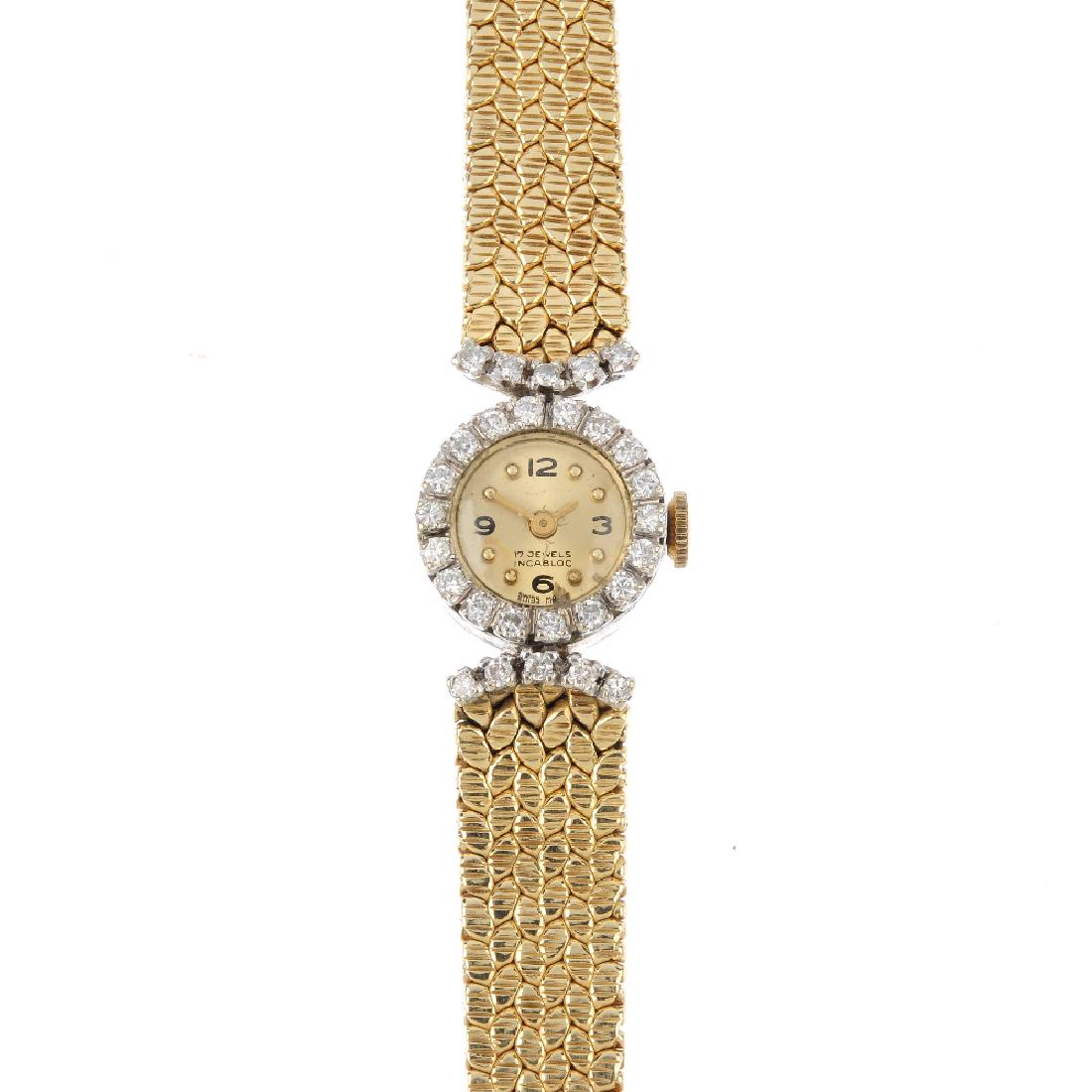 A lady's mid 20th century diamond cocktail watch. The (1 of 4)