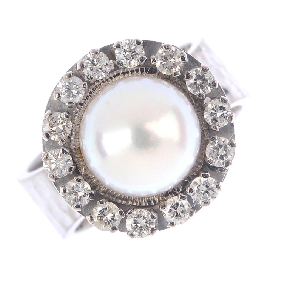 An 18ct gold cultured pearl and diamond ring. The (1 of 4)