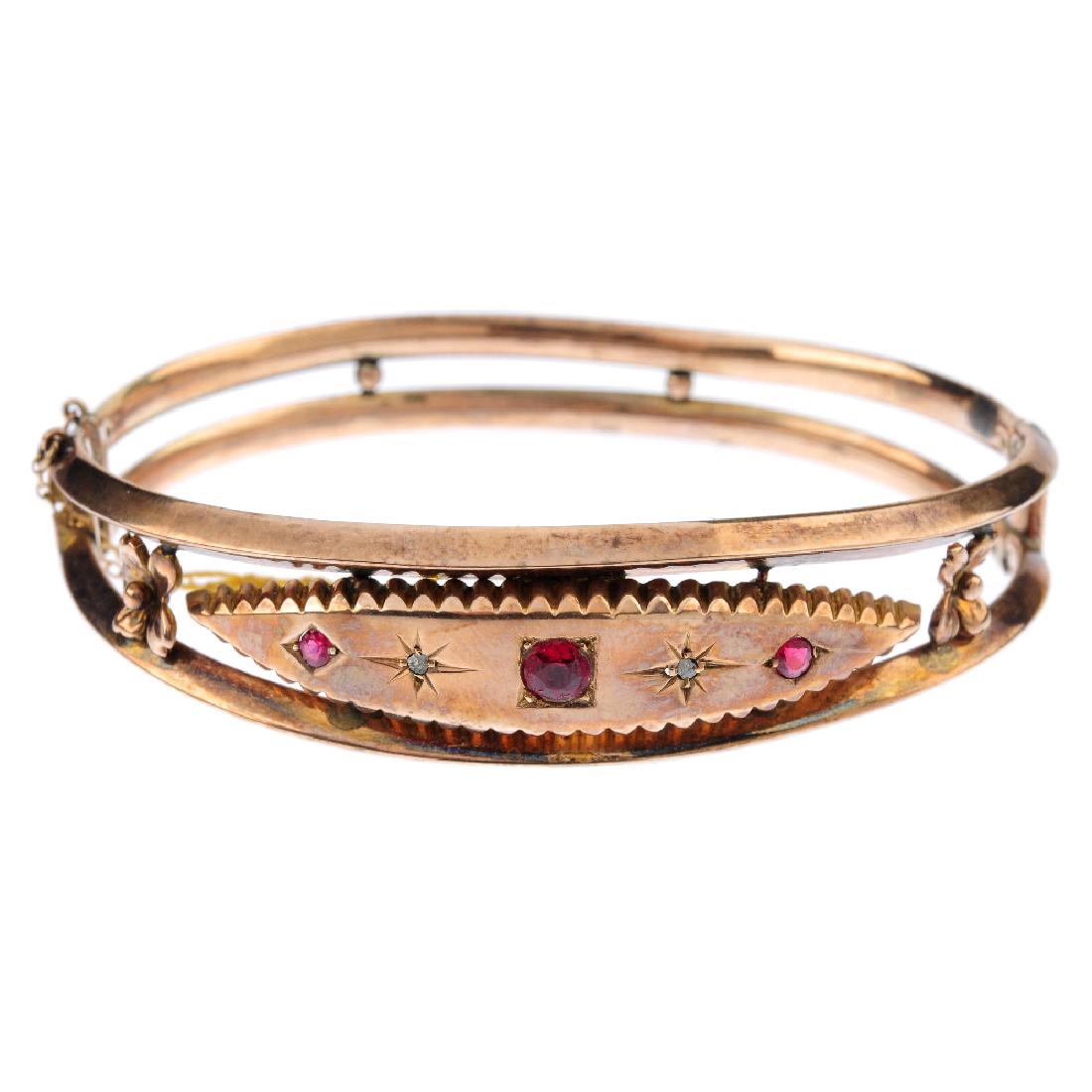 An Edwardian 9ct gold diamond and gem-set hinged (1 of 3)