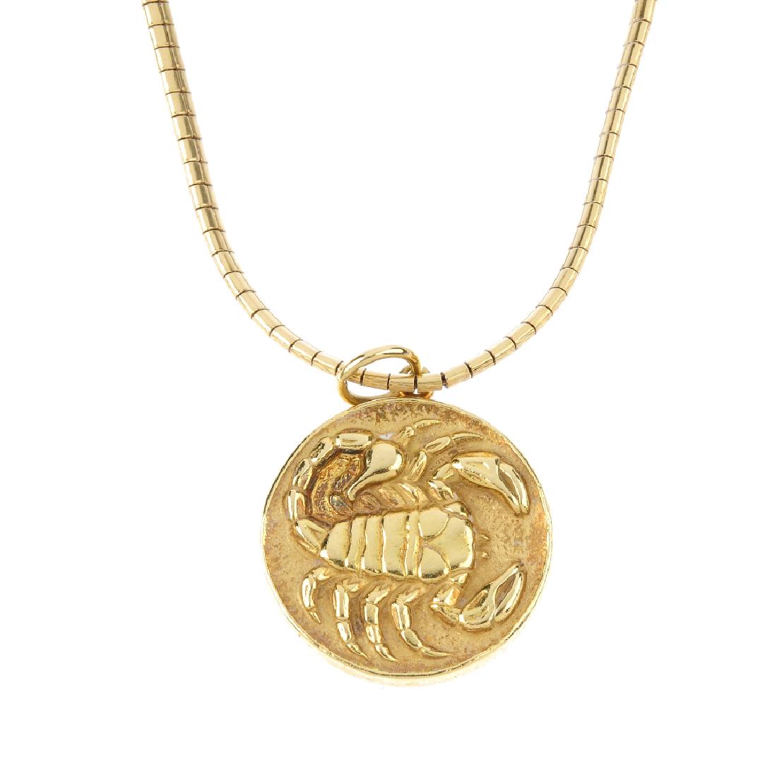 A 1970s 18ct gold 'Scorpio' zodiac pendant. The (1 of 3)