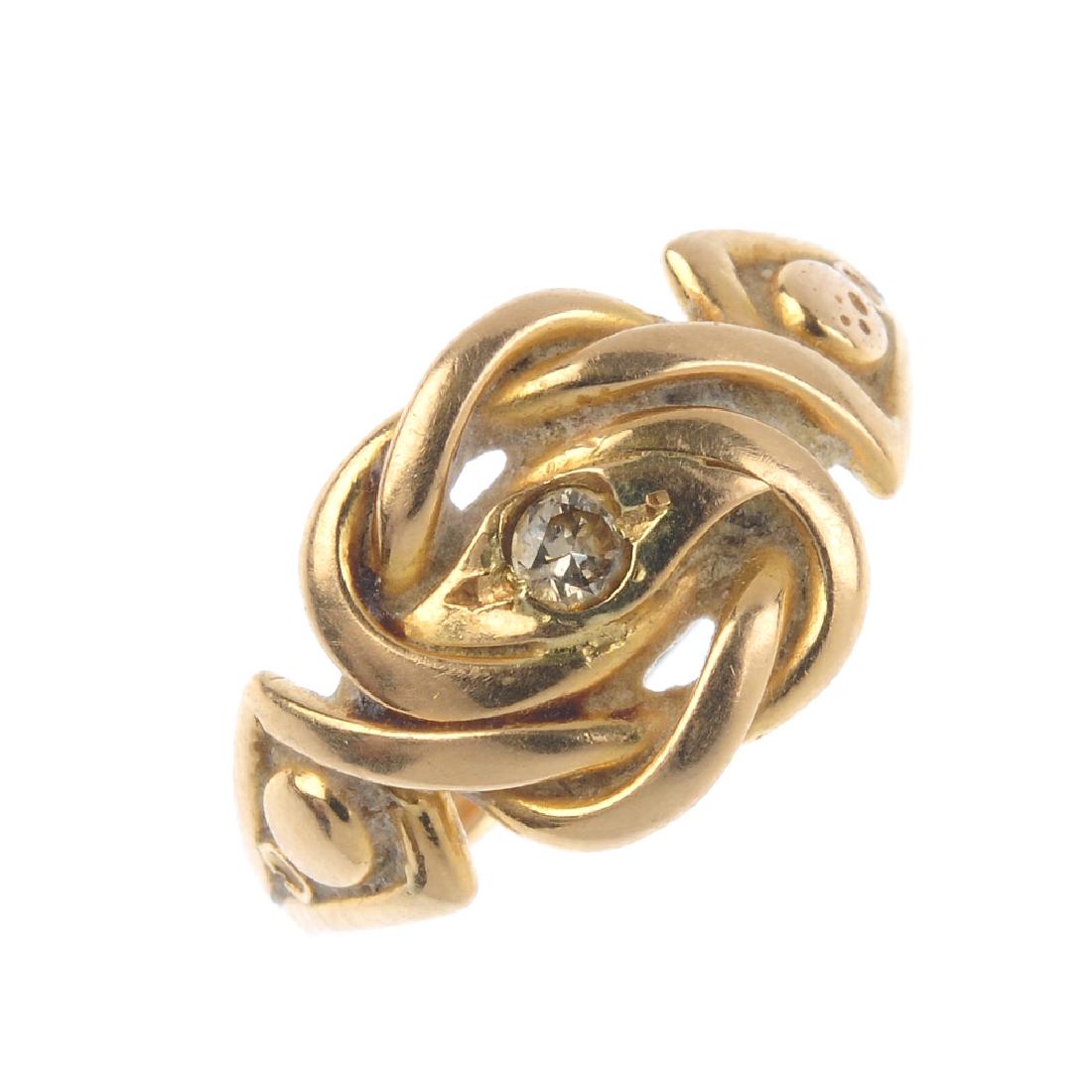 An early 20th century gold diamond dress ring. The (1 of 2)
