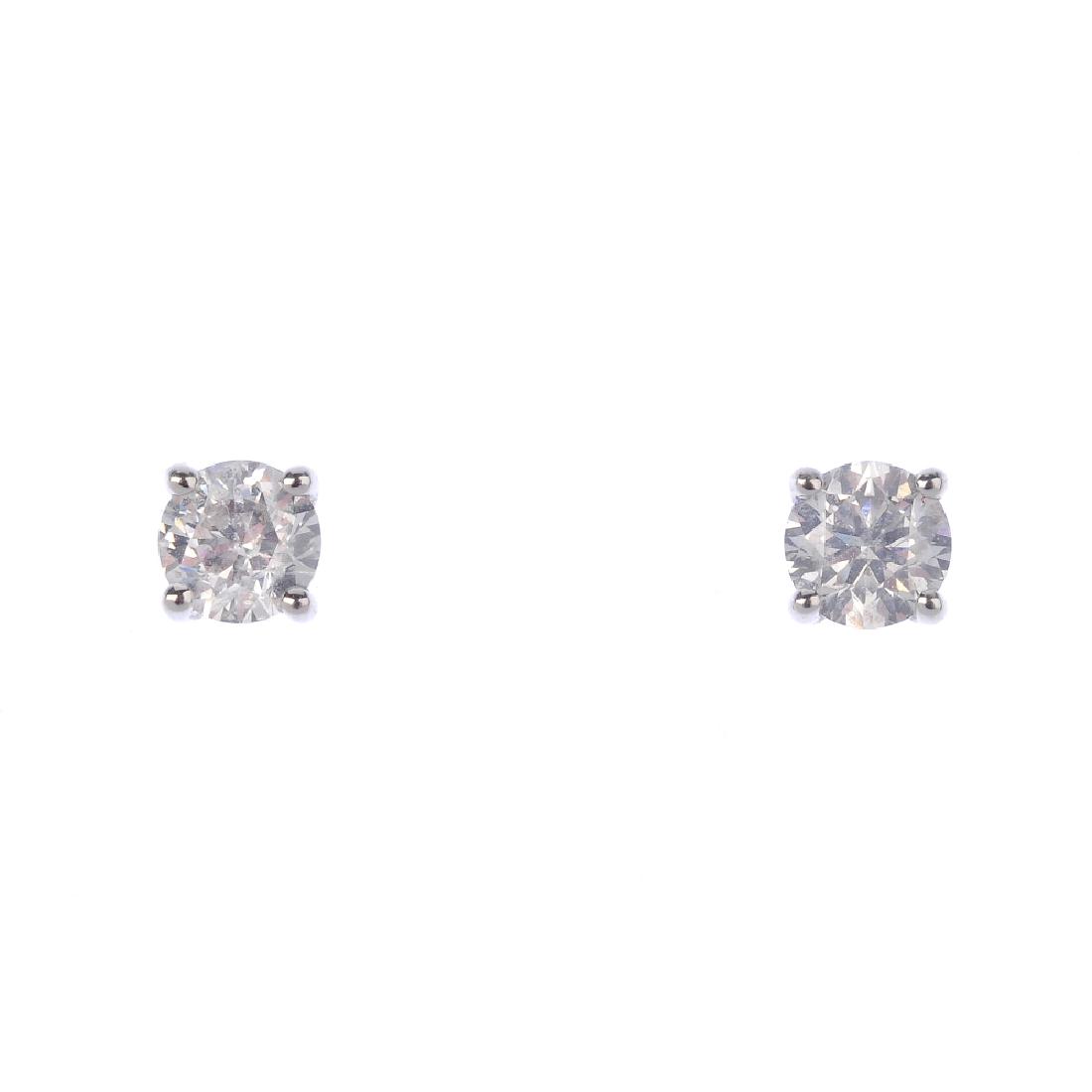 (17197) A pair of brilliant-cut diamond stud earrings. (1 of 3)