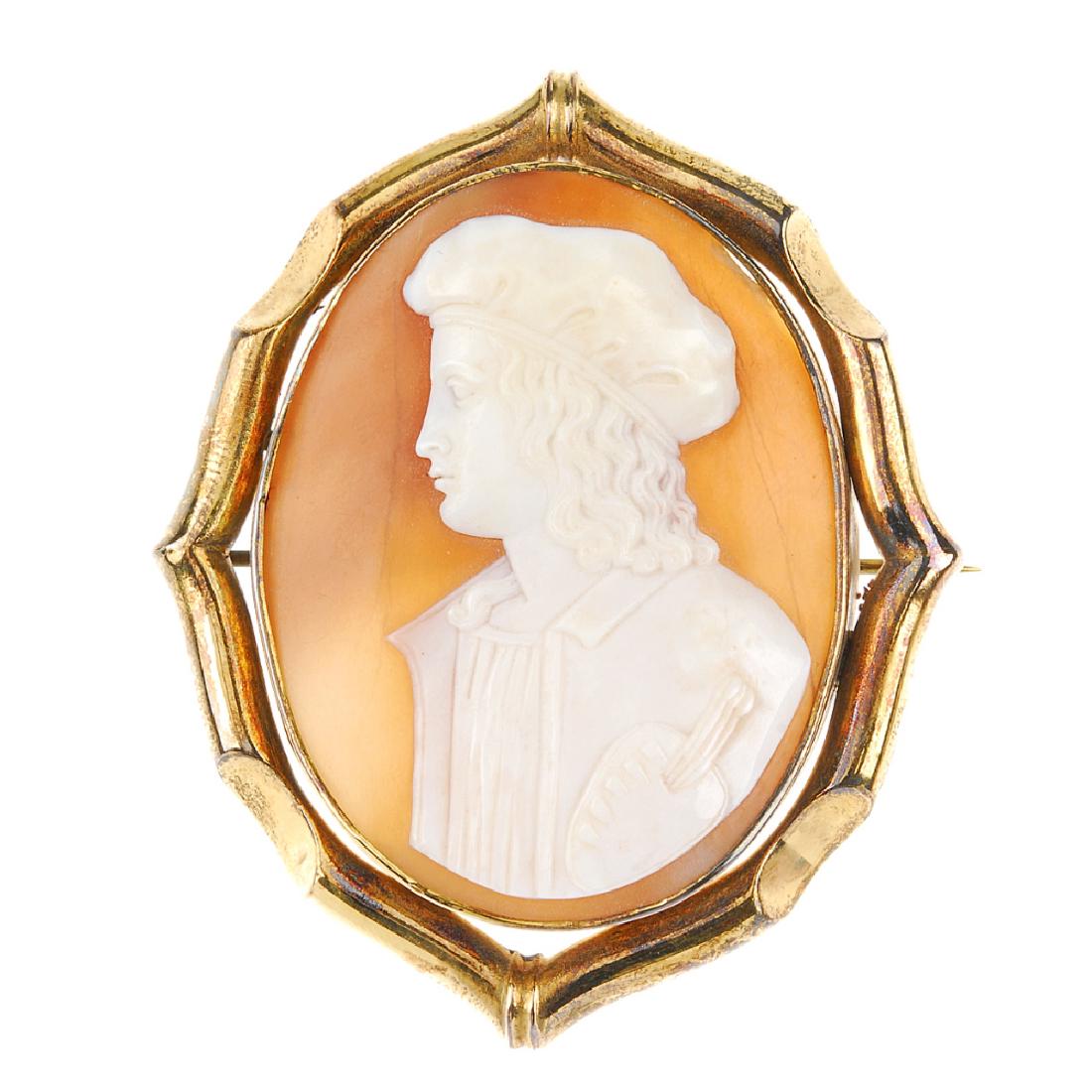 A large cameo brooch. The carved shell of oval outline: A large cameo brooch. The carved shell of oval outline depicting a boy in a hat and jacket, to the shaped bamboo style surround. Length 7.6cms. With fitted case, possibly not original case.