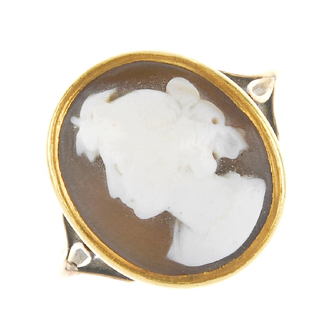 Four cameo rings. Each designed with oval cameo panels (1 of 3)