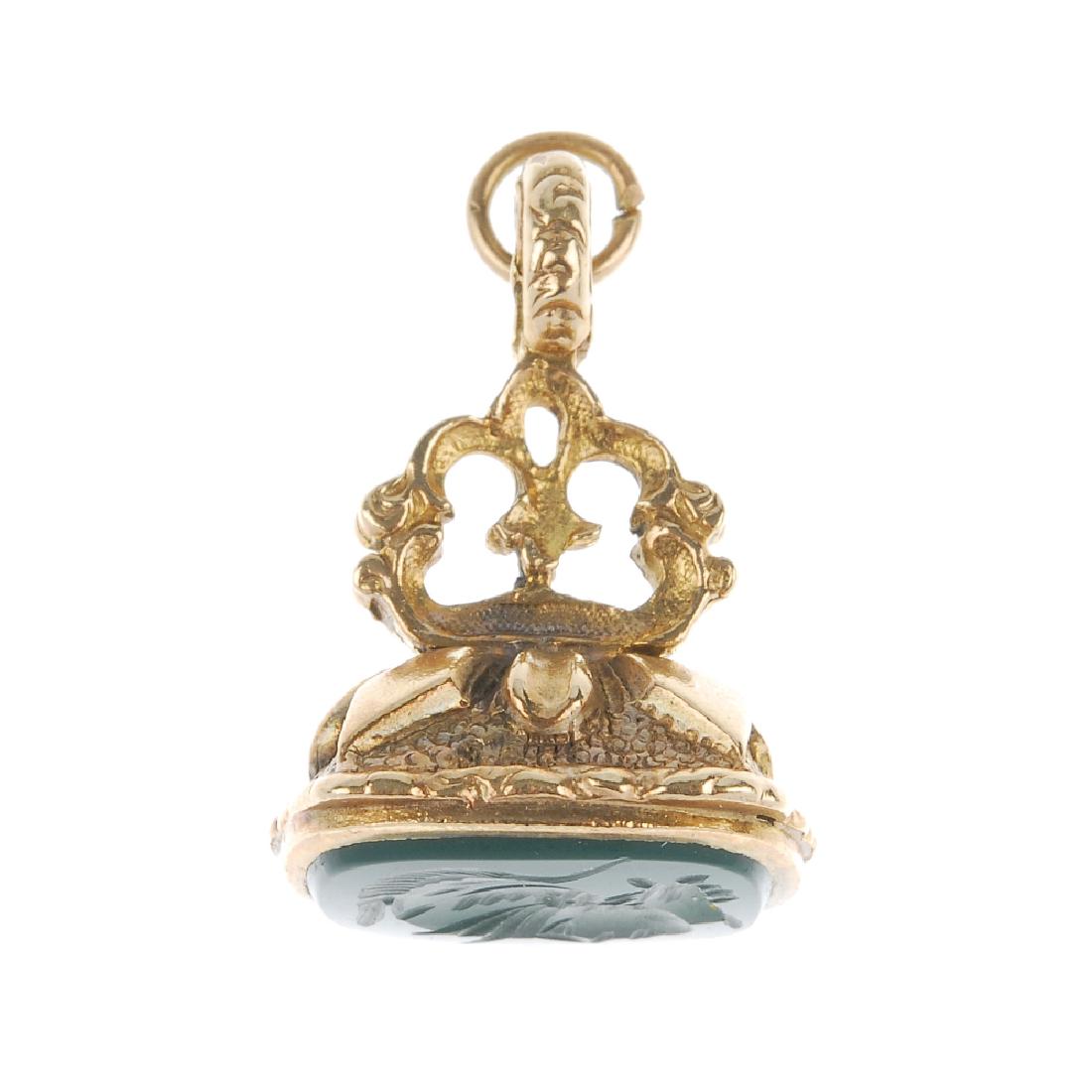 A 9ct gold hardstone intaglio fob. Designed as a green (1 of 3)