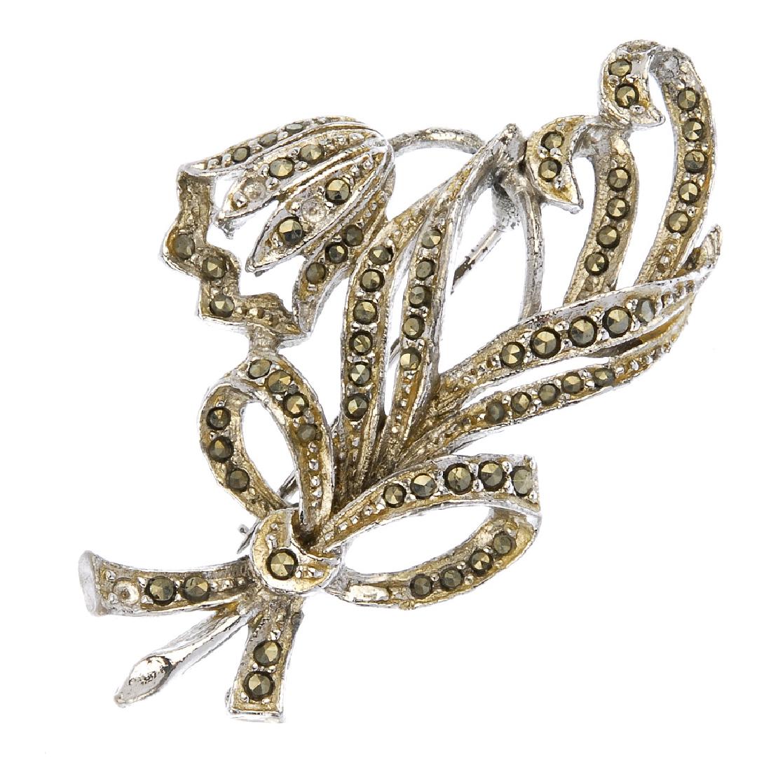 A selection of marcasite jewellery. To include mainly: A selection of marcasite jewellery. To include mainly brooches of foliate design. (26) Some with marks to indicate silver.
