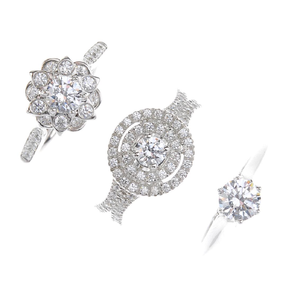 Three cases of cubic zirconia set sample rings. Stored (1 of 3)